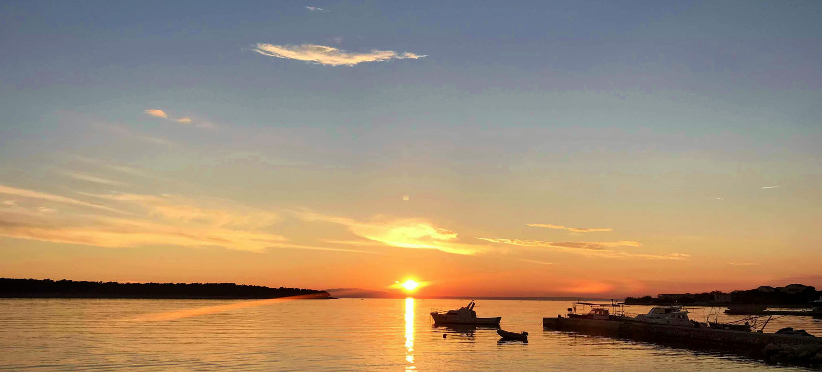 sunset on the beach in front of Balen apartments